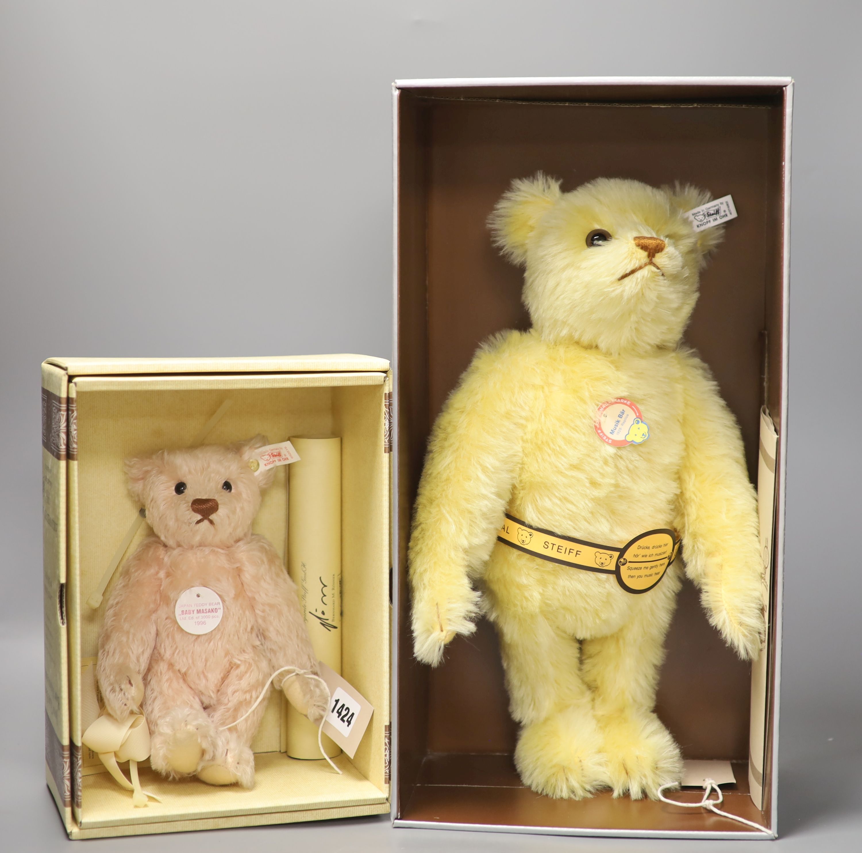 Steiff 1928 musical bear, box and certificate and Baby 'Masako' Japanese limited edition, box and certificate (2)
